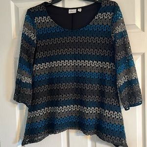 Blue, black, and white top